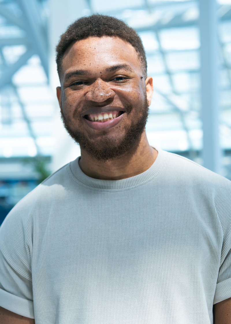 Headshot of a smiling man