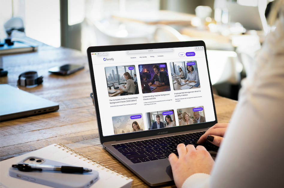 Person types on laptop with Ferretly blog page open.