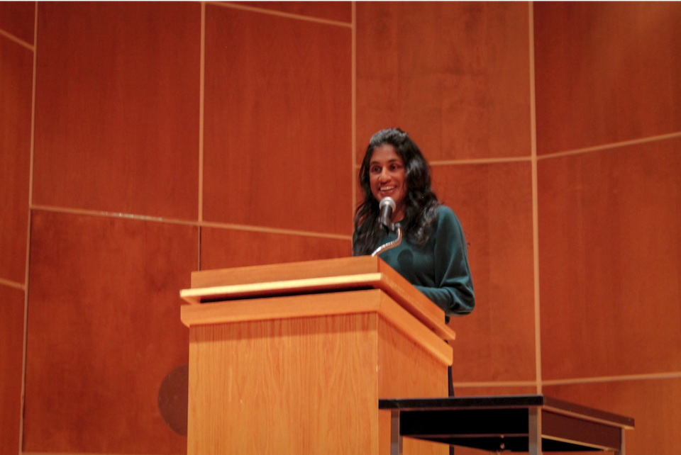 Vauhini Vara speaks at podium in Ulrich Recital Hall
